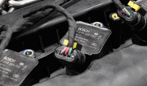 分析：点火线圈多久换一次(点火线圈有几种类型)  第3张